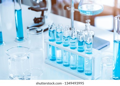 Laboratory test tubes and solution with stethoscope background. Science and Medical concept. Scientist research and analysis biotechnology concept