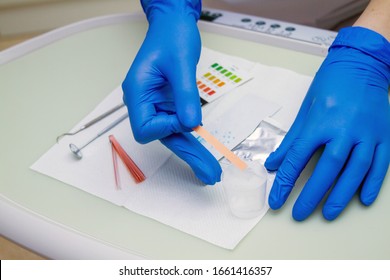 Laboratory Tests On Litmus Papers. The Presence Of Increased Acidity In Human Saliva. Gastrological And Dental Scientific Test.
