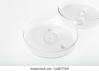 Laboratory utensils and facial serum on a white background. Alternative medicine, cosmetic research. Skin care. Dermatology. Top view. Background image.