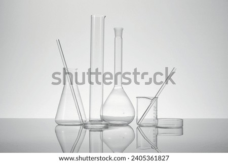 Laboratory ware on a clean light grey background 
