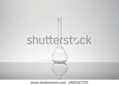 Laboratory ware on a clean light grey background 