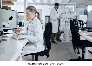 Laboratory Woman, Microscope Or Computer Typing In Cancer Research, Medical Healthcare Innovation Or Insurance Medicine. Mature DNA Scientist Or Science Ideas With Man In Teamwork Collaboration Study