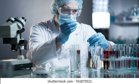 Laboratory Worker Measuring Exact Formula For Hypoallergenic Cosmetic Products