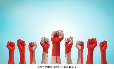 Labour Day Celebration With Canada National Flag Pattern On Canadian People Clenched Fist Hand Isolated On Sky Background For Labor Day Holiday 