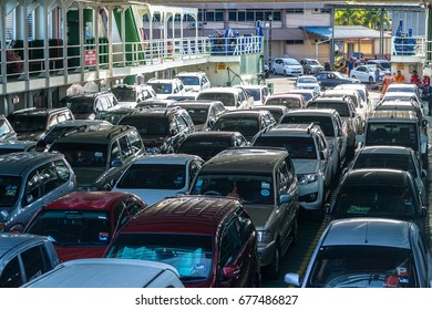Labuan,Malaysia-June 26,2017:View of vehicles & passengers that use a ferry to cross the South China Sea from Labuan island to Sabah.This is the economical transportation to the Labuan Pearl of Borneo - Shutterstock ID 677486827