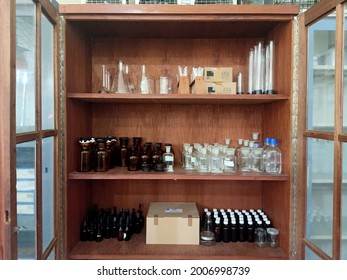 Labware on the shelf in an old fashioned laboratory 