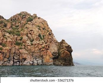 Laccolith Rock In The Sea In Cloudy Weather, The Extreme Point Of Bear Mountain (Au-Dag) Near Yalta In Crimea   