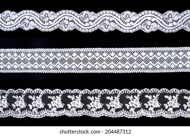 Lace Trim Ribbon Over Black Background