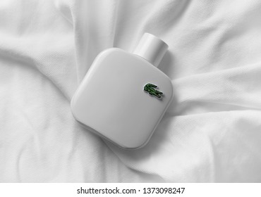 lacoste perfume white bottle