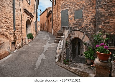 Lacoste, Vaucluse, Provence, France: picturesque ancient alley in the old town of the medieval village
					
					
					