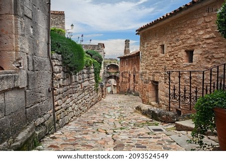 Lacoste, Vaucluse, Provence-Alpes-Cote d'Azur, France: ancient alley in the old town of the medieval village in the nature park of Luberon

