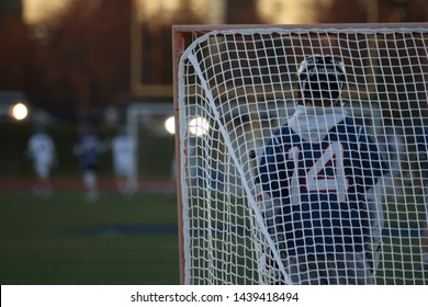 Lacrosse Goalie Looks Upon Game 