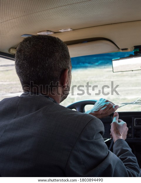 Lada Cab Driver in\
Gobustan, Azerbaijan