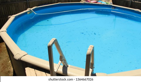 Ladder Leading Down Above Ground Round Pool