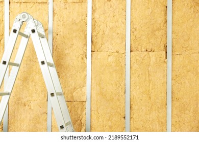 Ladder Near Wall With Metal Studs And Insulation Material