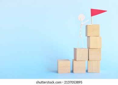 Ladder To Success Concept. Stick Man Climbing Stairs With A Red Flag.