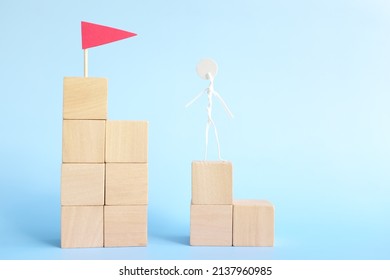 Ladder To Success Concept. Stick Man Climbing Stairs With A Red Flag.