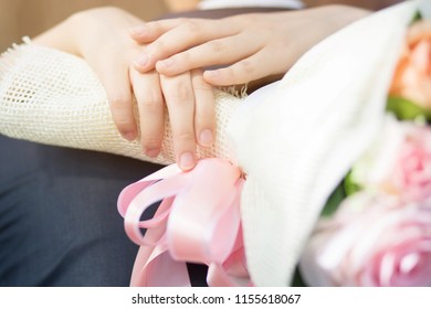 Ladies And Gentleman Loving Young Love Married Couple Hand Hug Neck Show The Love And Stand Together In Ceremony Wedding Day Marry Scene. Lover Happiness Very Happy. Hand With Rose Flower Bouquet.