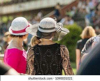 Ladies With Hats On The Race Track. Romantic Summer Hats. Retro Style Summer Romance In Sunny Day.