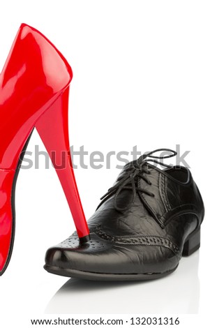 ladies shoes on men's shoe, symbol photo for separation, divorce and conflict