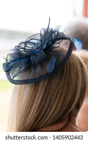 Lady In A Black Lace Hat At A Horse Race.