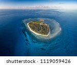 Lady Elliot Island and its coral reef viewed from the sky at sunset