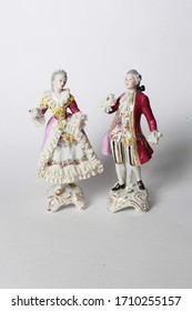 Lady And Gentleman Porcelain Figurines