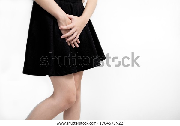 Lady girl with leucorrhoea,vaginitis,bacterial\
infection,young woman cover crotch or hold over her vagina with\
hands,vaginal discharge for bad fishy smell,unpleasant smell from\
private parts of female