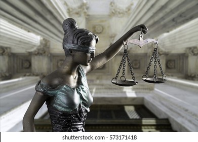 Lady Justice Isolated On Front Columns Of The Supreme Court Of U.S. Background