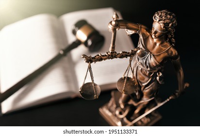 Lady justice. Statue of Justice in library. Legal and law background concept - Shutterstock ID 1951133371