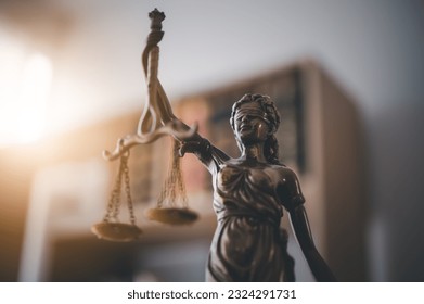 Lady justice,Law theme, mallet of the judge, law enforcement officers, evidence-based cases and documents taken into account.	