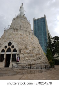 Lady of Lebanon/ Sayyidat Lubn?n/ Notre Dame du Liban
Shrine of Our Lady of Lebanon, Harissa, Lebanon
Contrast of ancient stone statue and modern glass church - Shutterstock ID 570254578