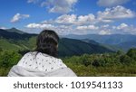 Lady looking mountain