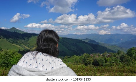 Lady looking mountain