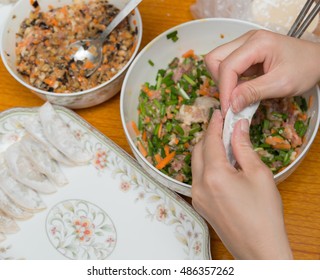 Lady Making Dumplings At Home