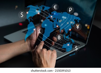 A lady with mobile phone  loaded with foreign currency. Currency exchange, money transfer, FinTech financial technology, global business, internet banking, and the notion of interbank payment.