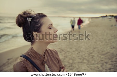 Lady posing on the beach