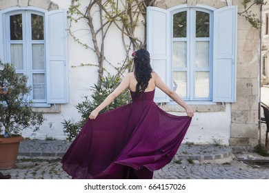 Lady In Purple Dress