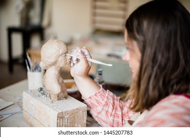 Lady Sculptor Working In Her Studio, Ceramis Artist's Hands