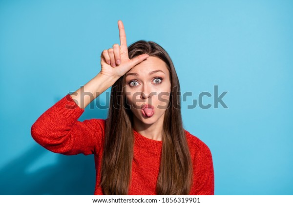 lady-showing-loser-gesture-on-600w-1856319901.jpg