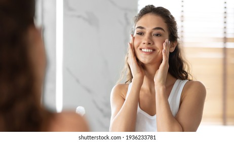 Lady Touching Face With Perfect Smooth Skin Standing In Bathroom - Shutterstock ID 1936233781