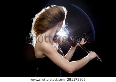 Similar – Close up side view profile portrait of one young middle age athletic woman shadow boxing in sportswear in gym over dark background, looking away