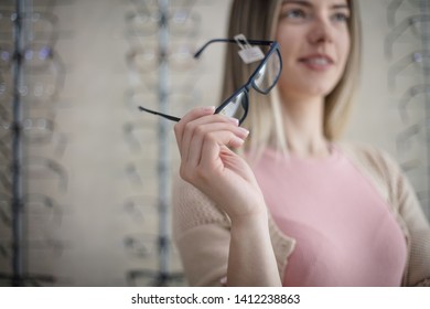 For a lady. Woman in optical shop.