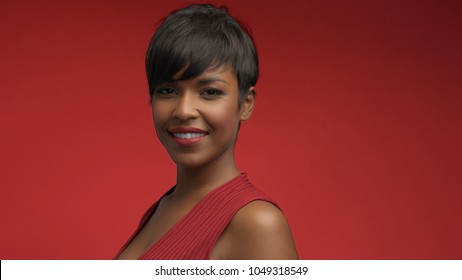 lady woman in red on red mixed race african american woman in red dress on red background