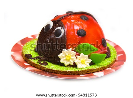Ladybird cake isolated against white background