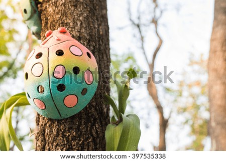 Ladybug on tree,summer,beetles,statue