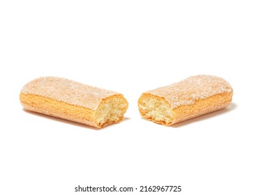 Ladyfingers or savoiardi biscuit broken in half, italian dessert and sponge cookies, isolated on white background