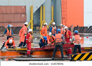 LAEM CHABANG - OCTOBER 2: Workers preparing for shipment of the 6,000 ton Gudrun module for shipment from Thailand to Norway in Laem Chabang, Thailand on October 2, 2012.
