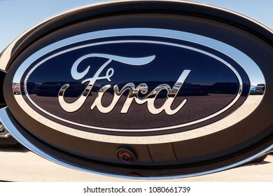 Lafayette - Circa April 2018: Ford Oval Tailgate Logo On An F-150 Pickup Truck. Ford Sells Products Under The Lincoln And Motorcraft Brands XIV