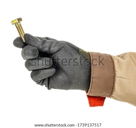 Lage bolt in worker hand in black protective glove and brown uniform isolated on white background
